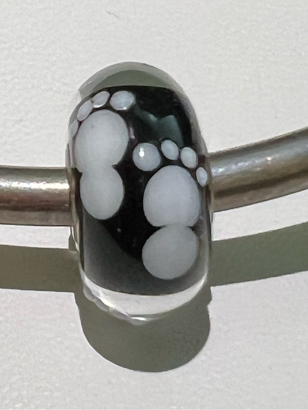 Trollbeads Black Glass Bead with White Foot print